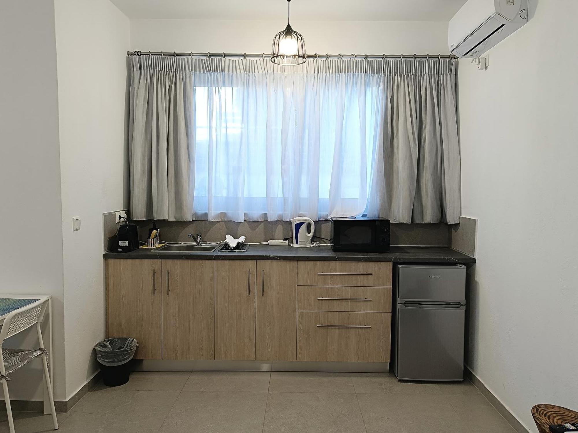 Sun Day Apartments Free Airport Shuttle อาร์เตมีดา ภายนอก รูปภาพ